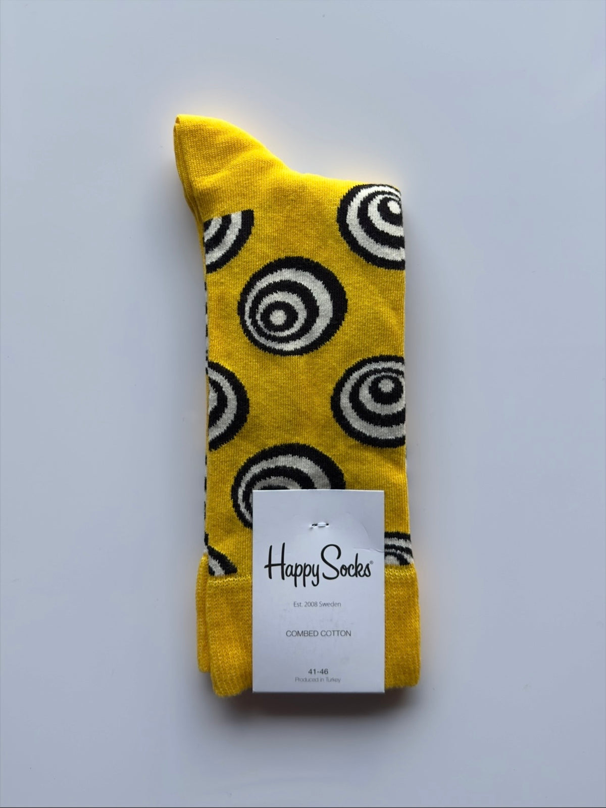 Men's Happy Sock Combed Cotton From Fireqasi withYellow sock with black and white spiral pattern 